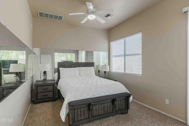 bedroom with visible vents, baseboards, carpet, and ceiling fan