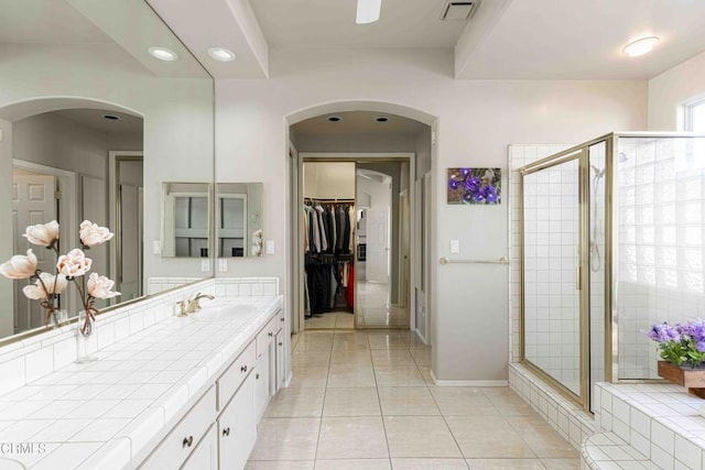 full bath featuring visible vents, a stall shower, vanity, and tile patterned flooring