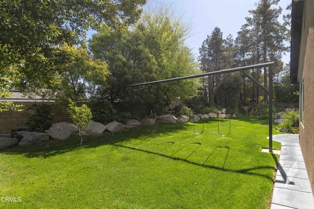 view of yard with fence