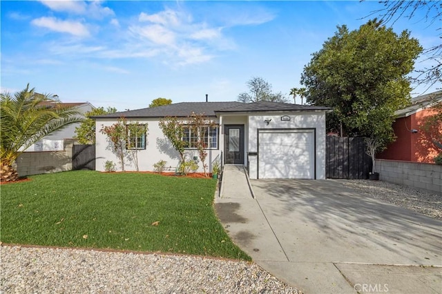 ranch-style home with stucco siding, driveway, fence, a front yard, and a garage