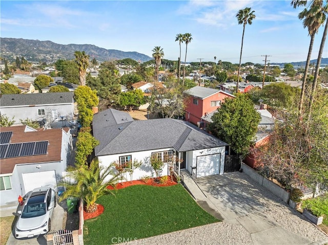 birds eye view of property featuring a residential view and a mountain view