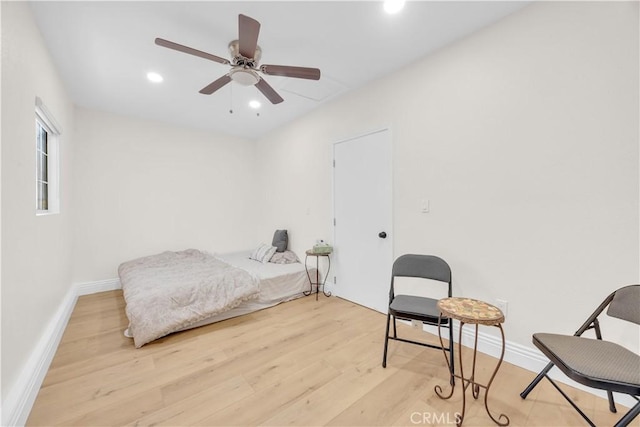 bedroom with recessed lighting, baseboards, wood finished floors, and a ceiling fan