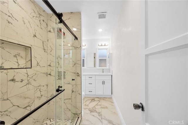 full bathroom with vanity, visible vents, a marble finish shower, baseboards, and marble finish floor