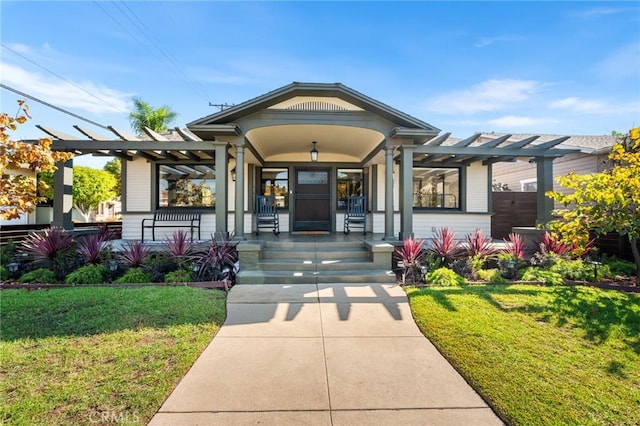 274 Grand Ave, Long Beach, CA 90803 - view of front facade with a porch, a front yard, and a pergola