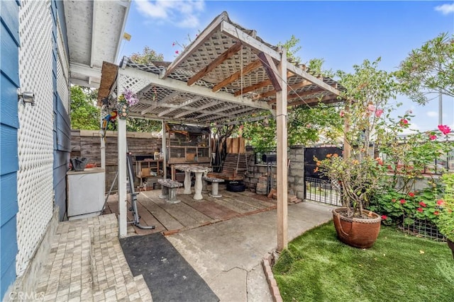 6324 Denver Ave, Los Angeles, CA 90044 - view of patio with a pergola and a fenced backyard