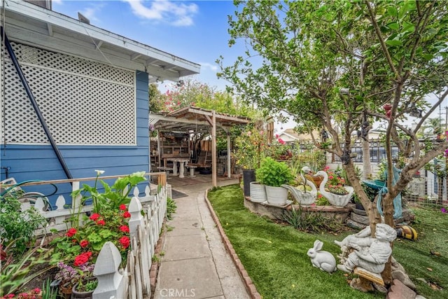 6324 Denver Ave, Los Angeles, CA 90044 - view of yard with a pergola and fence