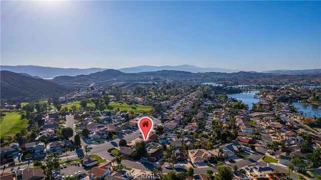 bird's eye view with a residential view and a water and mountain view