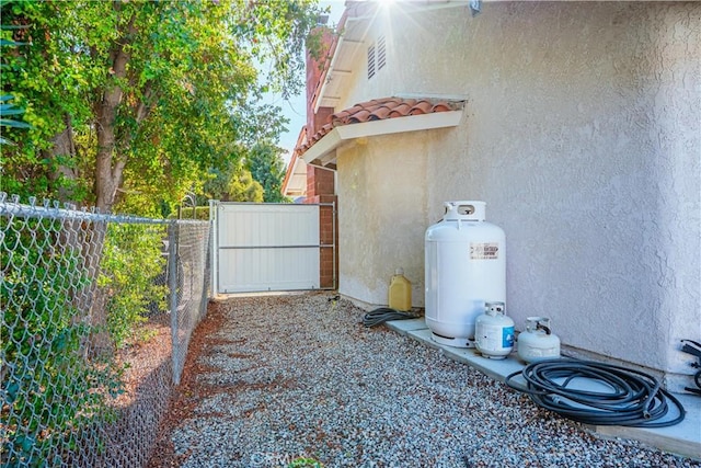 exterior space with a gate and fence