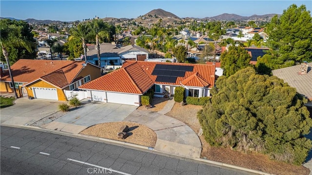 bird's eye view featuring a mountain view and a residential view