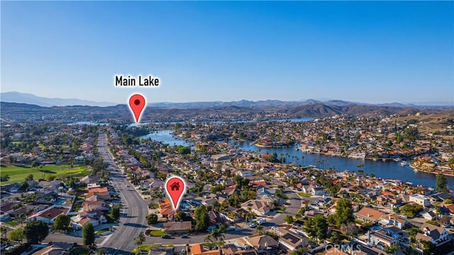 bird's eye view featuring a residential view and a water and mountain view