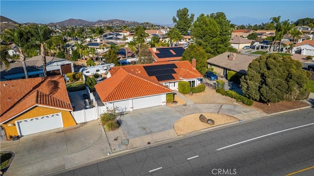 aerial view with a mountain view and a residential view