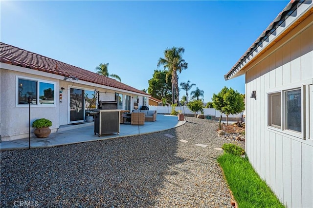 view of yard with a patio and fence