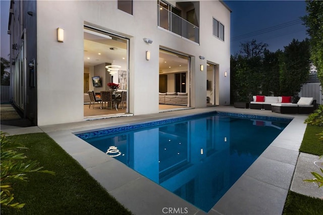 view of pool featuring a fenced in pool, an outdoor hangout area, and a patio area