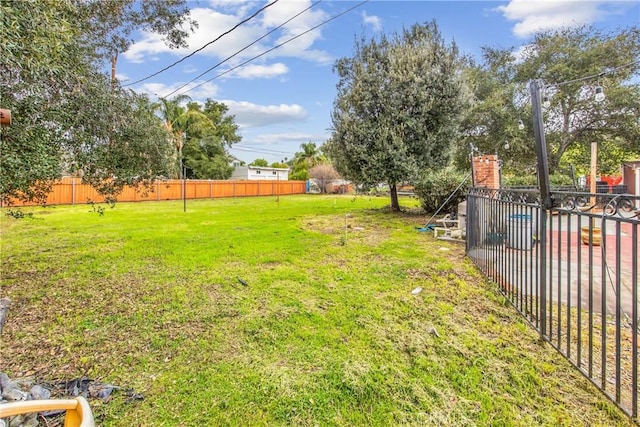 view of yard featuring fence