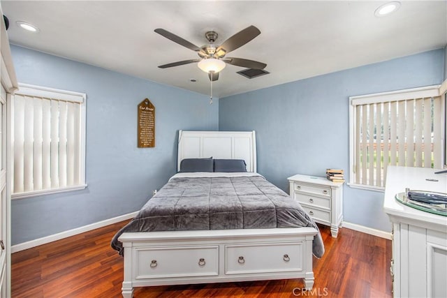 bedroom with visible vents, baseboards, dark wood finished floors, recessed lighting, and a ceiling fan