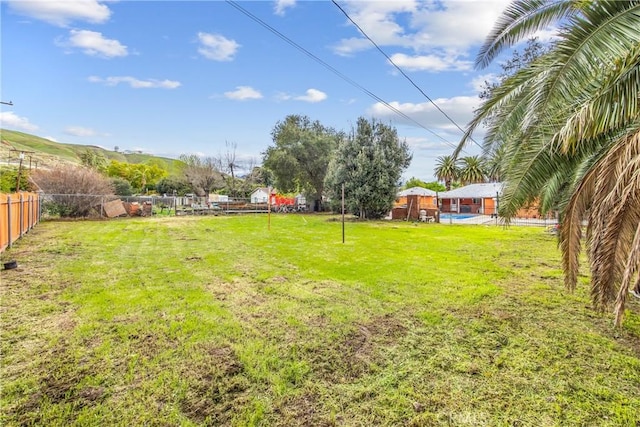 view of yard featuring fence