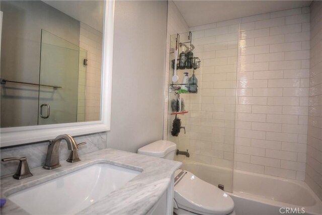 full bathroom featuring toilet, vanity, and shower / bath combination