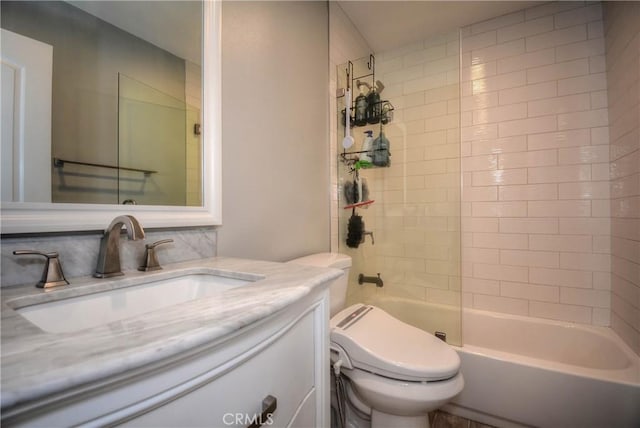 full bath with toilet, vanity, and shower / bathtub combination