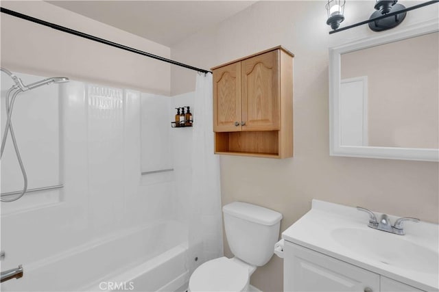 full bathroom featuring shower / bath combination, toilet, and vanity