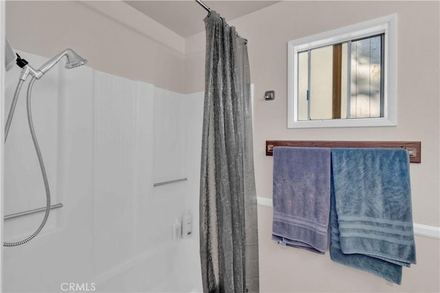 full bath featuring curtained shower