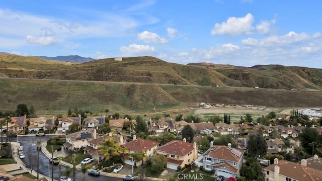 bird's eye view with a residential view and a mountain view