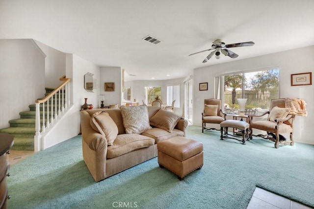 living room with visible vents, carpet, stairs, recessed lighting, and a ceiling fan