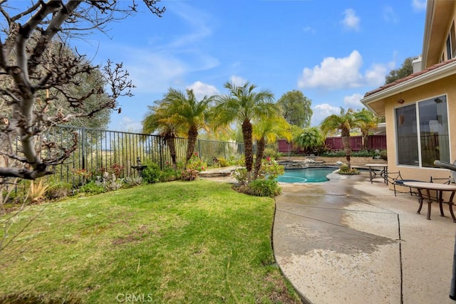 view of yard featuring a fenced in pool, a fenced backyard, and a patio area