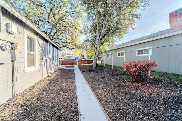view of yard featuring fence