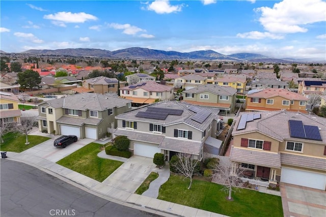 bird's eye view featuring a mountain view and a residential view