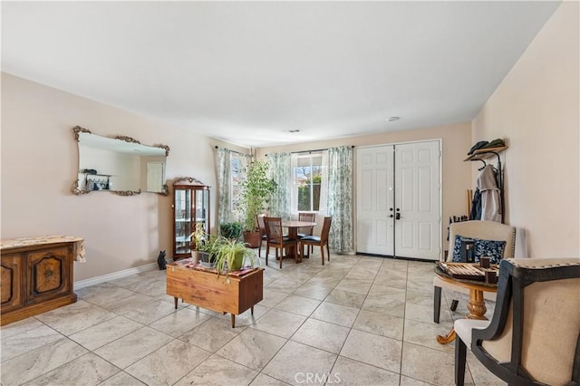 sitting room featuring baseboards