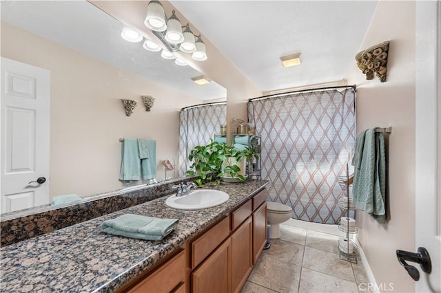 bathroom featuring vanity, a shower with shower curtain, baseboards, tile patterned floors, and toilet