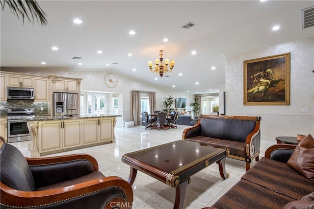 68340 Verano Rd, Cathedral City, CA 92234 - living area with visible vents, an inviting chandelier, ornamental molding, and vaulted ceiling