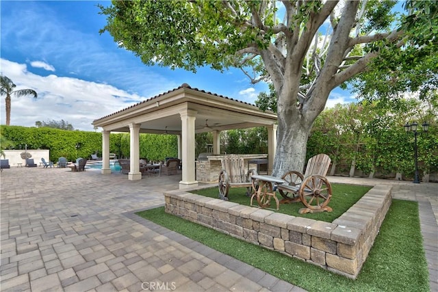 68340 Verano Rd, Cathedral City, CA 92234 - view of patio / terrace featuring a gazebo, a fenced backyard, an outdoor pool, and outdoor dry bar