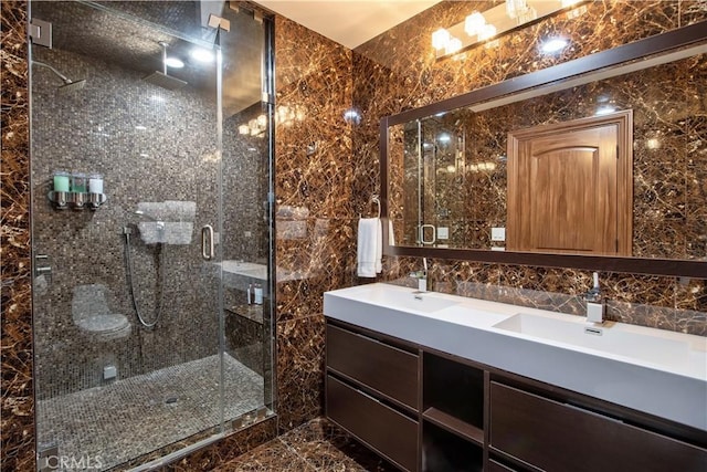 68340 Verano Rd, Cathedral City, CA 92234 - bathroom featuring double vanity, a shower stall, tile walls, and a sink