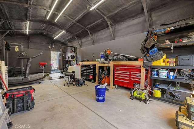 22292 N Tuolumne Rd, Twain Harte, CA 95383 - garage featuring a workshop area
