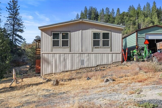 22292 N Tuolumne Rd, Twain Harte, CA 95383 - view of side of home featuring a detached garage