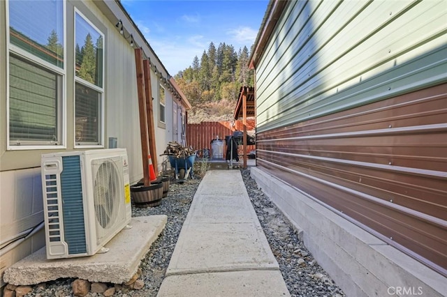 22292 N Tuolumne Rd, Twain Harte, CA 95383 - view of side of home with ac unit and fence