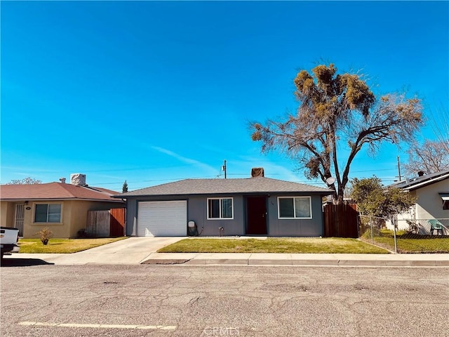 ranch-style home featuring driveway, a front lawn, fence, a garage, and a chimney