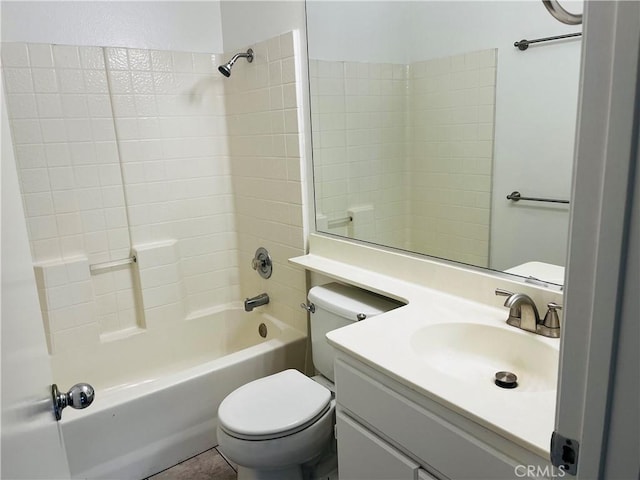 bathroom with toilet, vanity, and shower / bathing tub combination