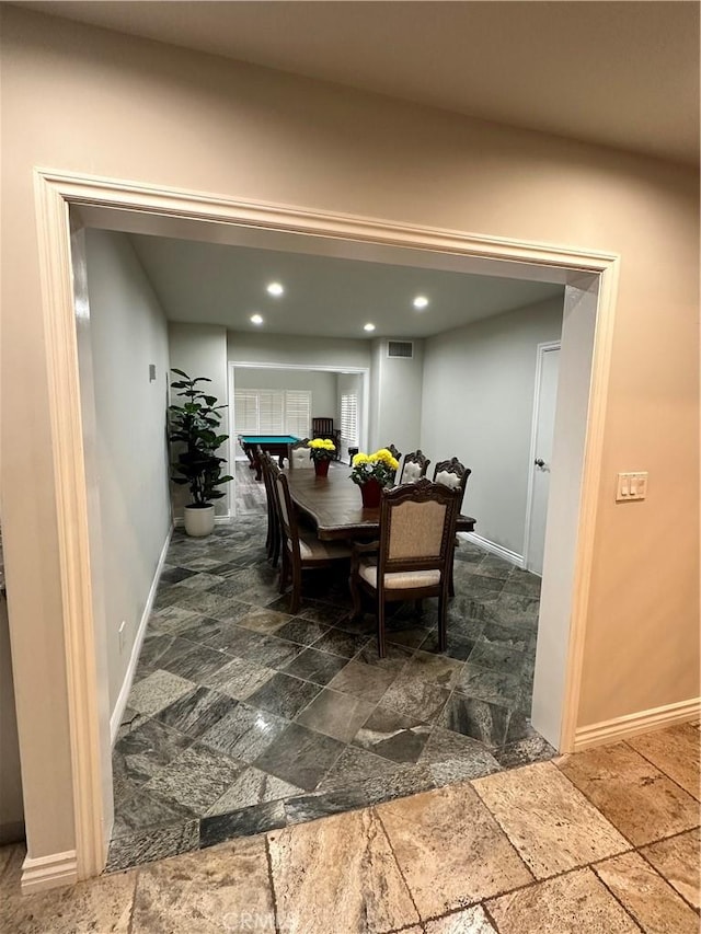 dining area with stone finish floor, recessed lighting, baseboards, and visible vents