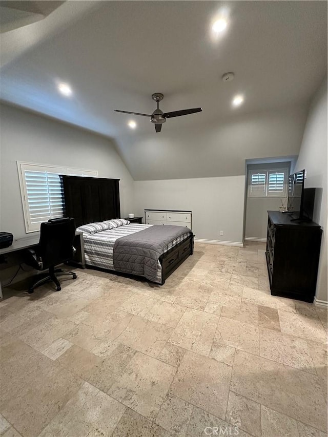 bedroom featuring lofted ceiling, stone tile floors, recessed lighting, and baseboards