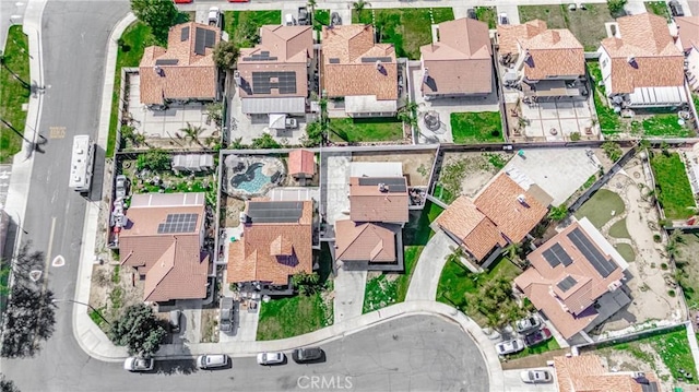 birds eye view of property with a residential view