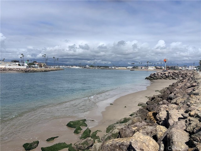 property view of water featuring a beach view