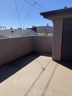 view of patio with a balcony