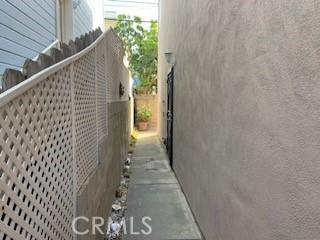 view of side of property with stucco siding