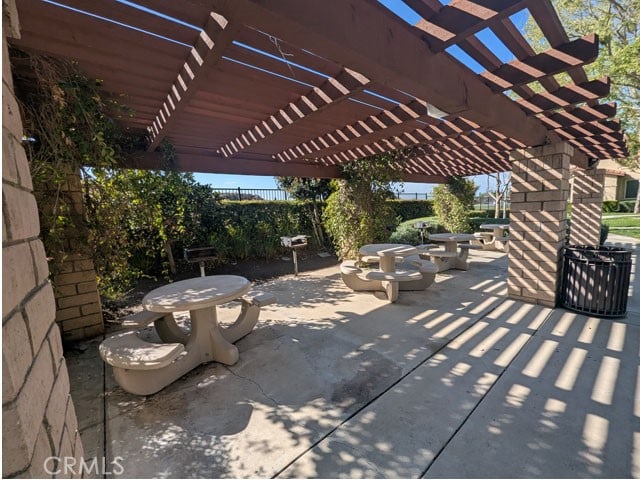 9770 Winterberry Dr, Riverside, CA 92803 - view of patio featuring fence and a pergola