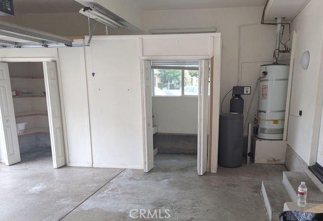 9770 Winterberry Dr, Riverside, CA 92803 - interior space featuring secured water heater
