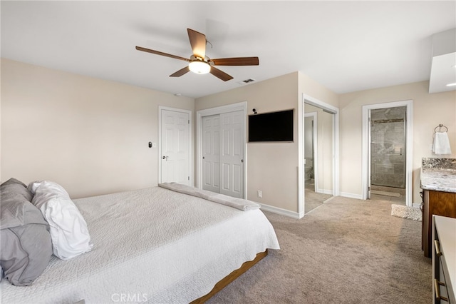 bedroom featuring ceiling fan, light colored carpet, visible vents, and baseboards