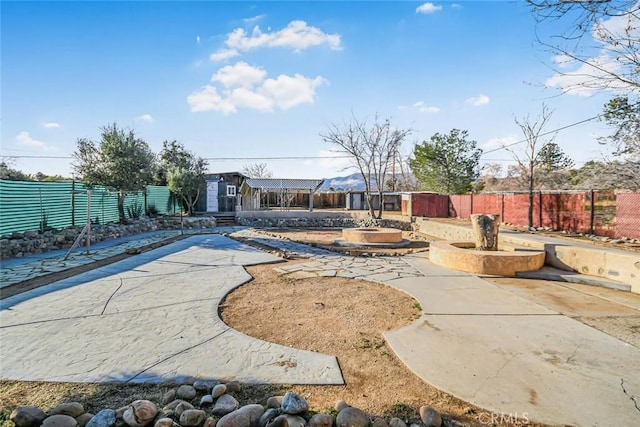 exterior space featuring a fenced backyard