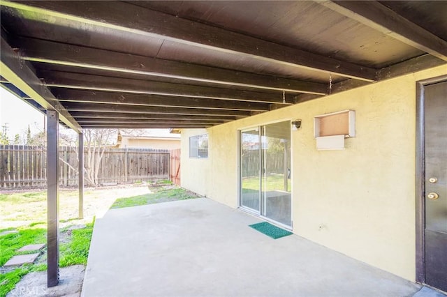 view of patio with fence